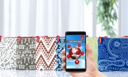 Neceser Turista Emirates Los diferentes diseños exteriores de los nuevos neceseres de clase turista de Emirates pueden ser escaneados para acceder a contenidos multimedia.